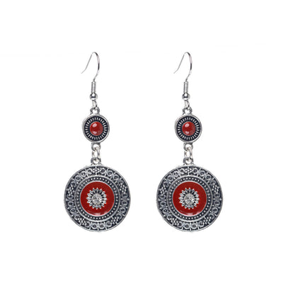 Hanging ethno earrings with glass stone