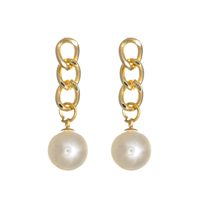 Pearl earrings hanging from a chain