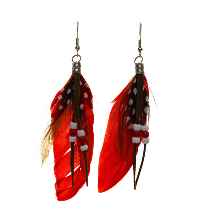 Hanging feather earrings with pearls