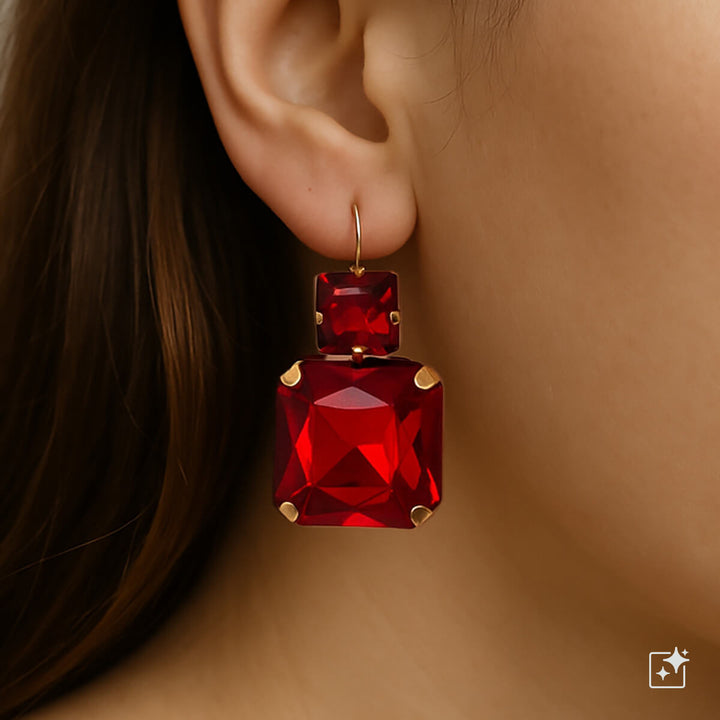 Dangling party earrings with square stones