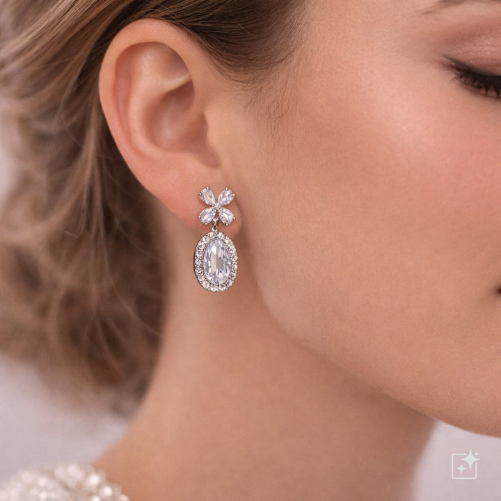 Delicate teardrop-shaped zirconia party earrings with flower top