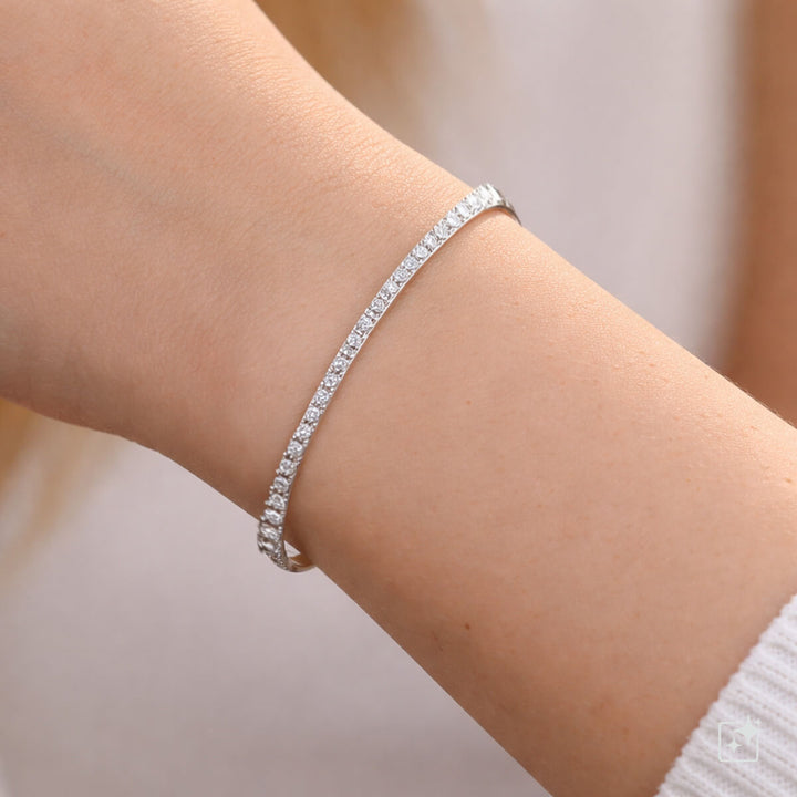 Narrow bangle with hinge and zirconia stone row (316L steel)