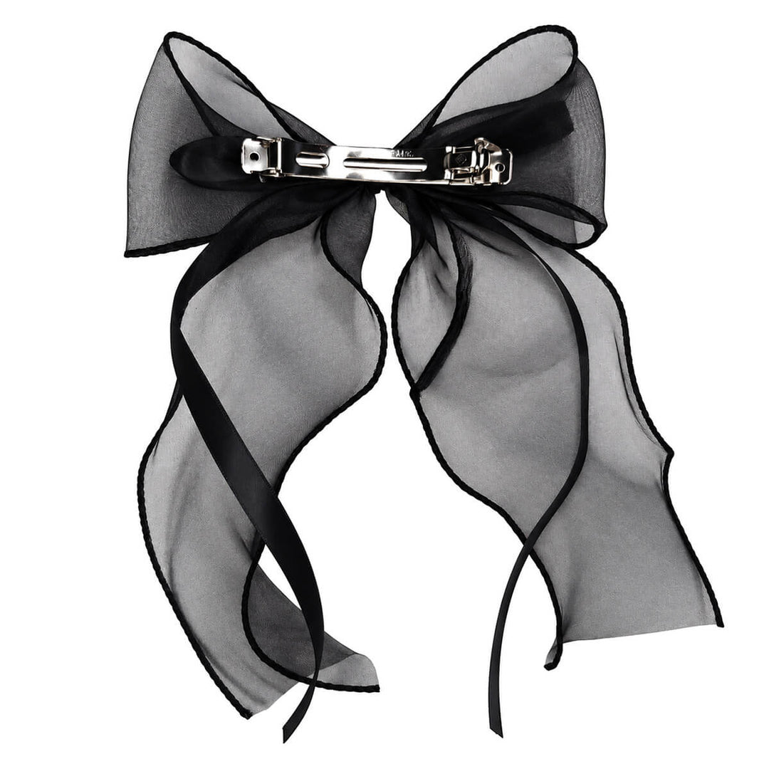 Lightweight, lace-like hair bow with a clasp