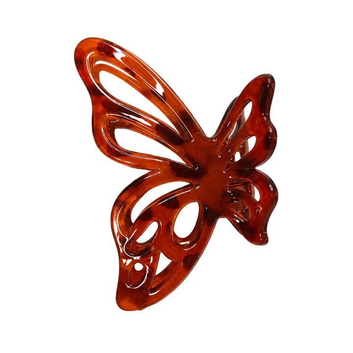 Butterfly-shaped plastic shark tooth hair clip, 7.2 cm