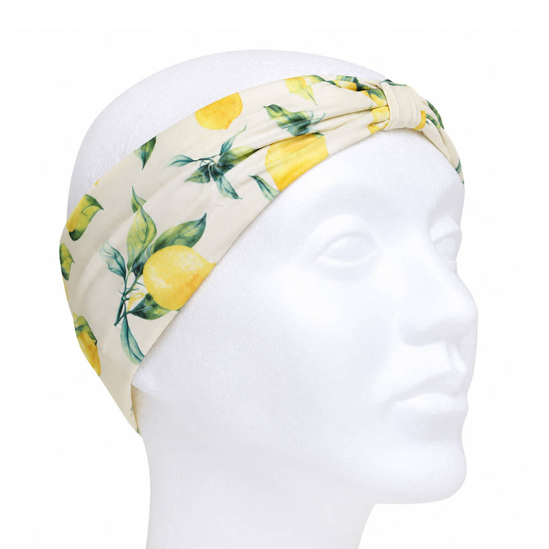 Wide headband with a lemon pattern and a bow