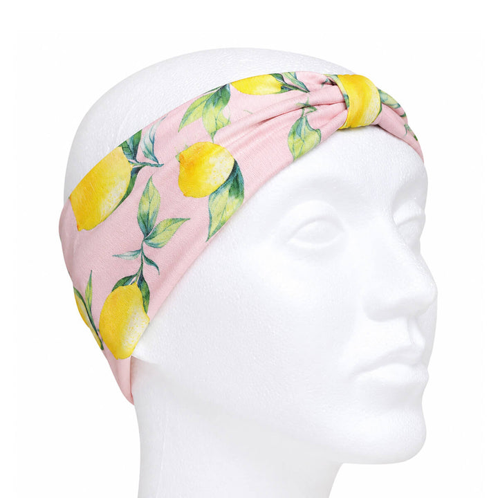 Wide headband with a lemon pattern and a bow