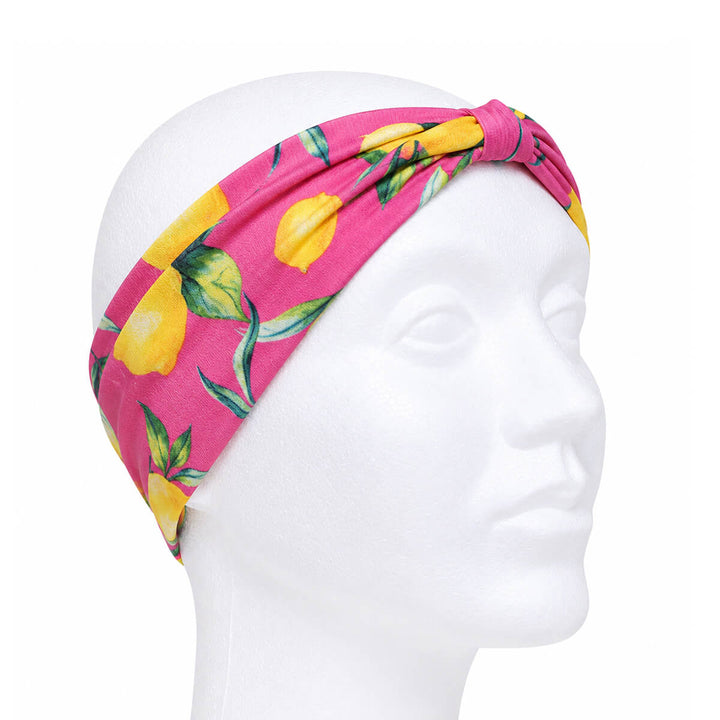 Wide headband with a lemon pattern and a bow