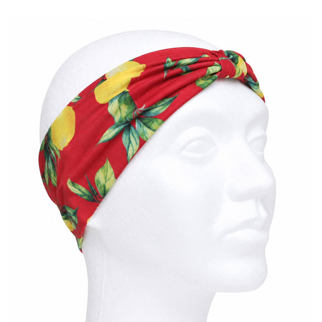 Wide headband with a lemon pattern and a bow