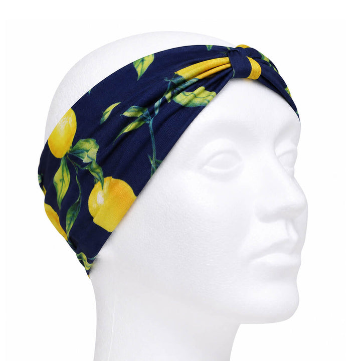 Wide headband with a lemon pattern and a bow