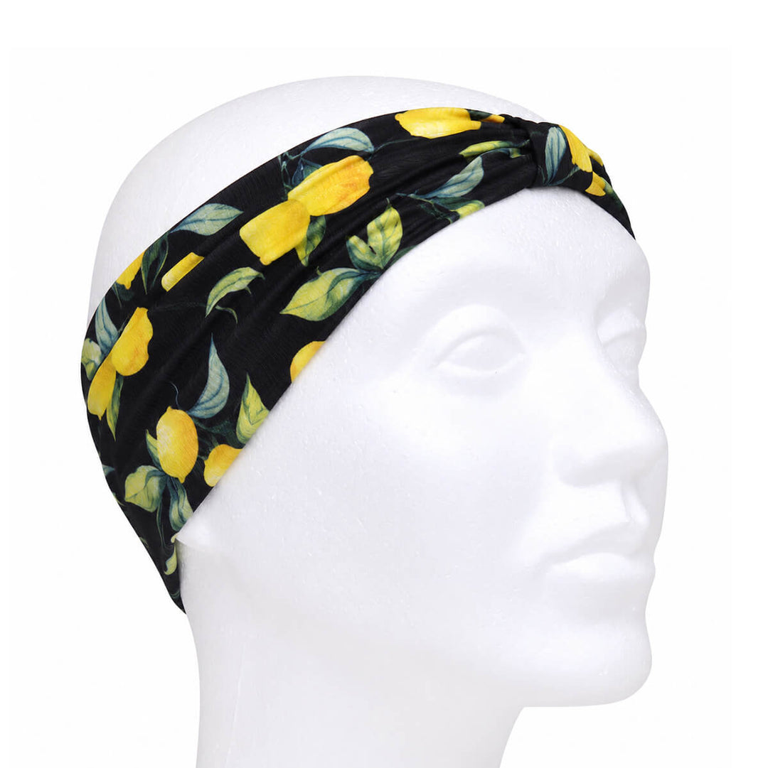 Wide headband with a lemon pattern and a bow