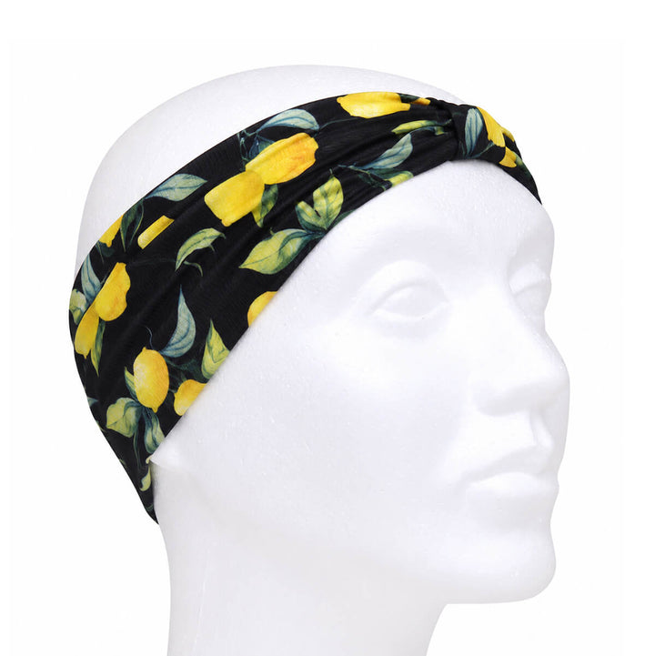 Wide headband with a lemon pattern and a bow