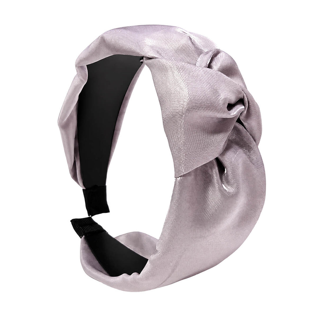 Wide, shiny headband—with a knot in the fabric