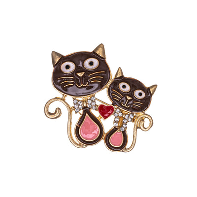Two cats brooch