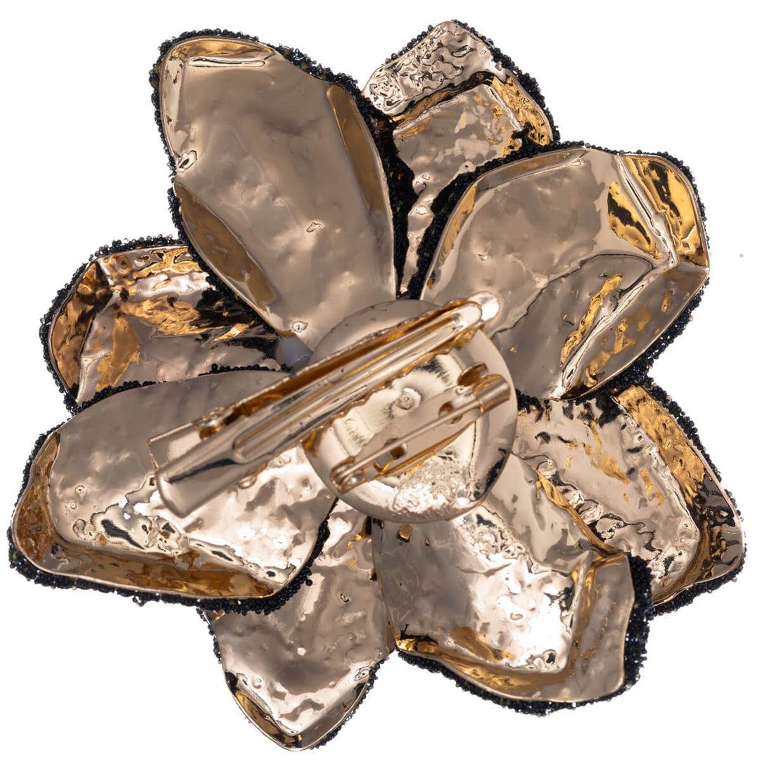 Large sparkling flower brooch with glass stones