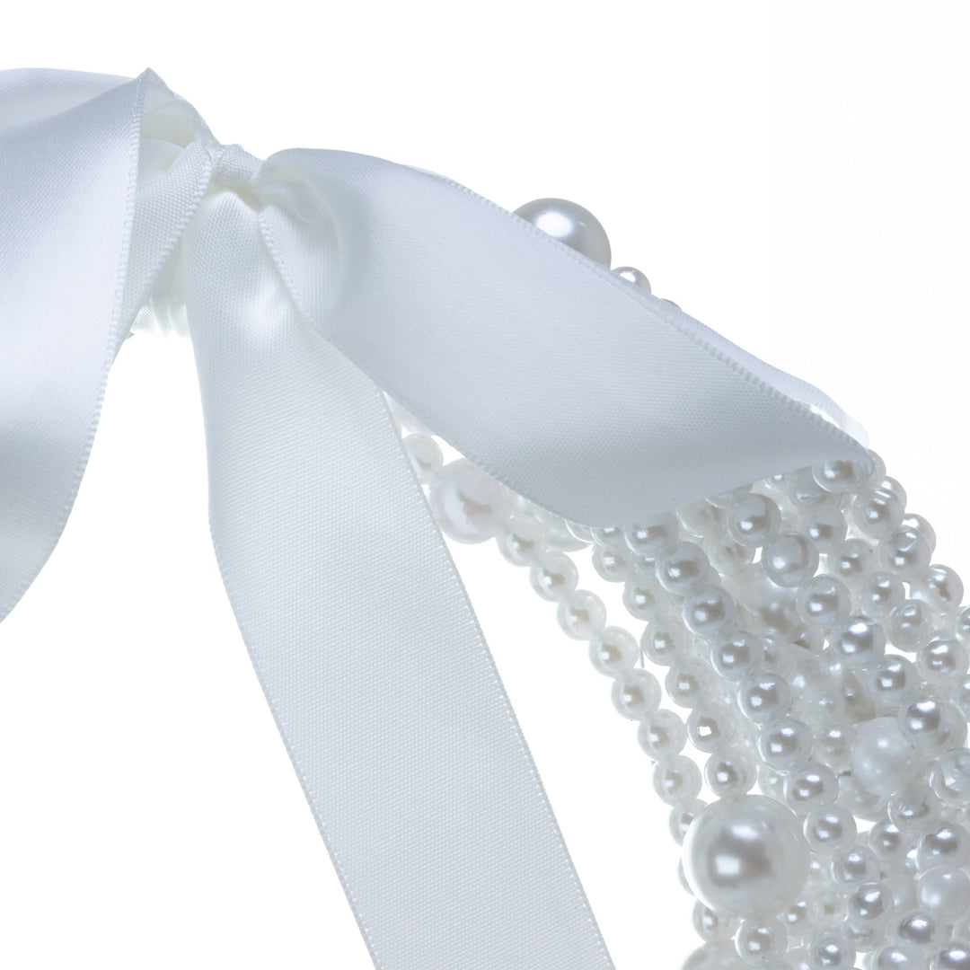 A bridal bouquet with a pearl arch – white artificial flowers