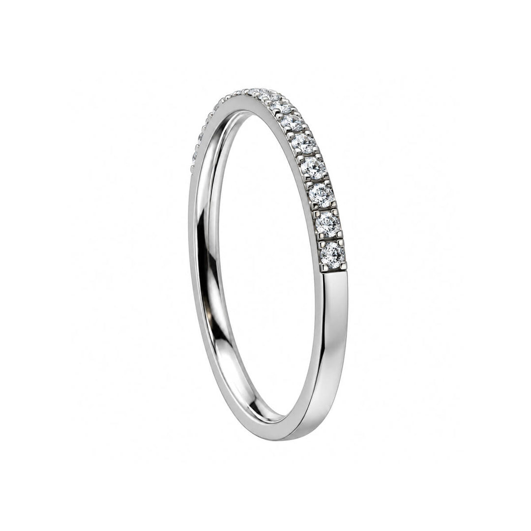 A silver-colored steel ring featuring a row of half-cut cubic zirconia stones and a smooth half