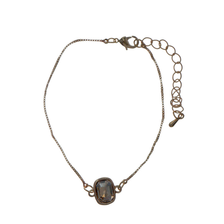 A bracelet with a glass stone